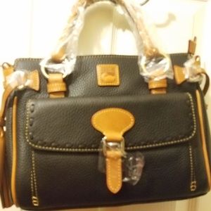 Designer handbag in black with brown trim